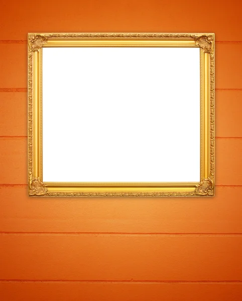 Порожня золота рамка на крихітній цементній стіні — стокове фото