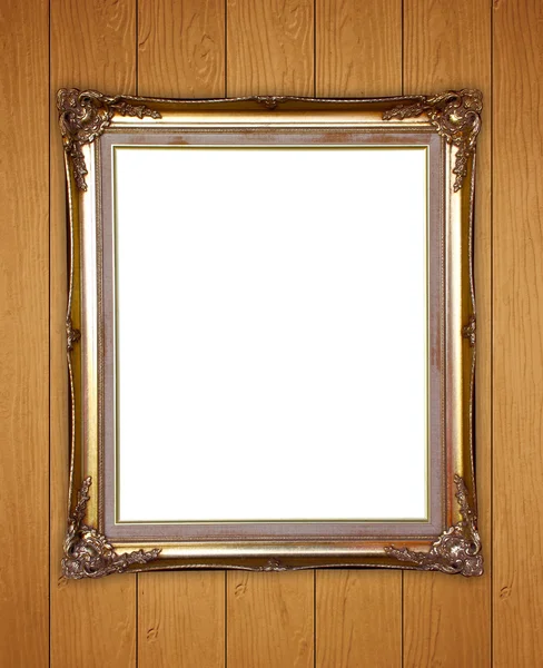 Golden frame on wood wall background — Stock Photo, Image