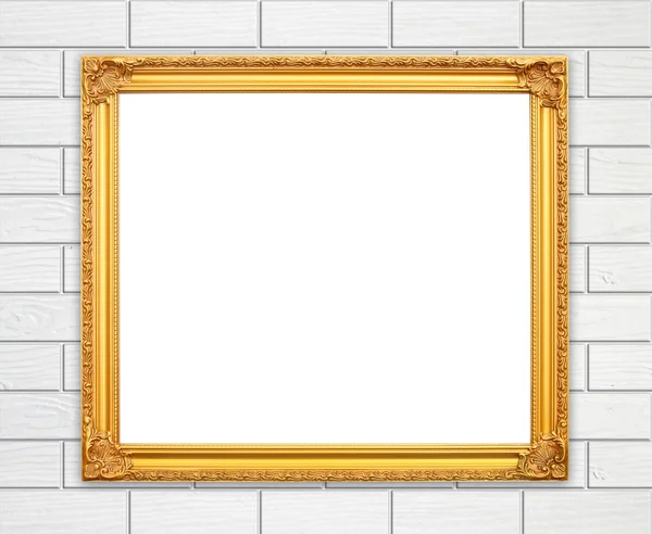 煉瓦石造り壁に空白のゴールデン フレーム — ストック写真