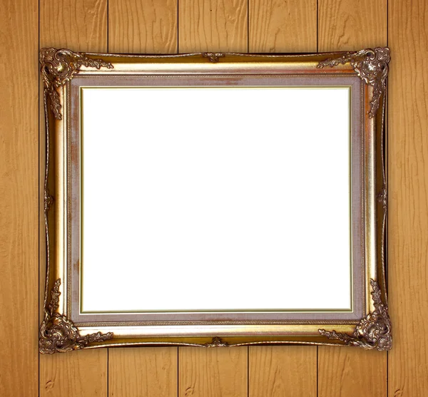 Gouden frame op houten muur achtergrond — Stockfoto