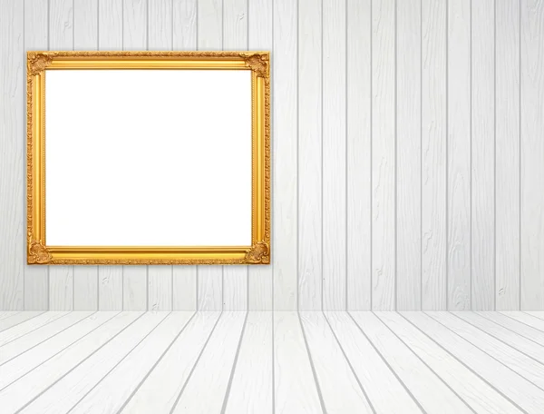 Prázdný zlatý rám s bílým dřeva zdi a dřevěné podlahy v místnosti — Stock fotografie