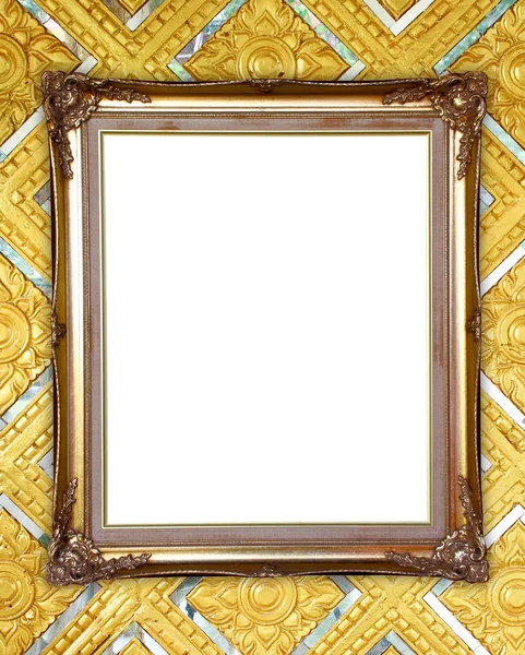Golden frame on Thai style buddha wall — Stock Photo, Image