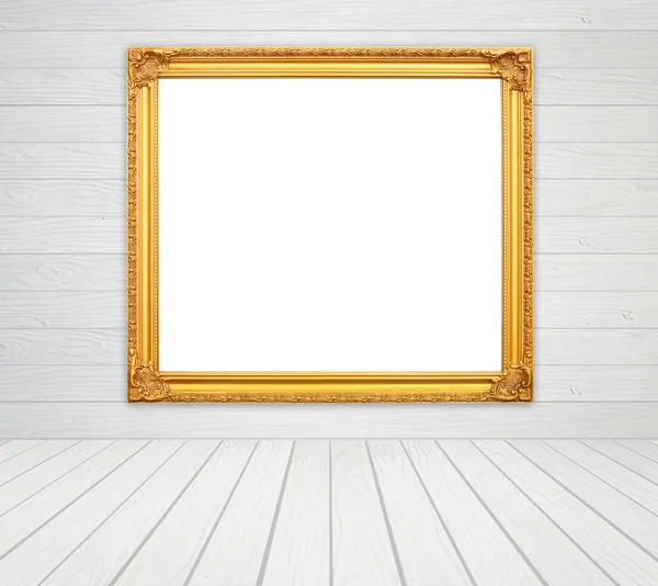 blank golden frame in room with white wood wall and wood floor