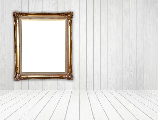 Golden frame in room — Stock Photo, Image