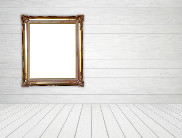 Blank golden frame in room with white wood wall and wood floor background