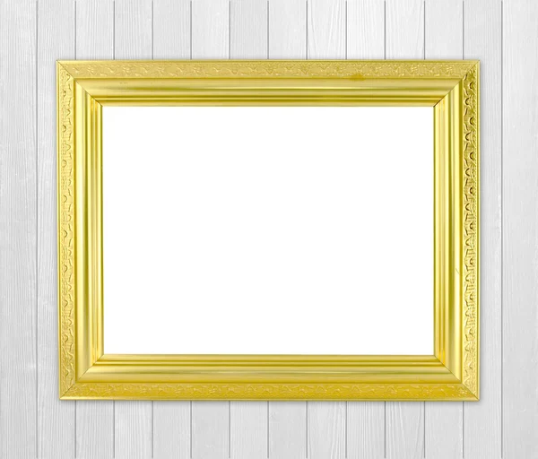 Blank golden frame on wood wall — Stock Photo, Image