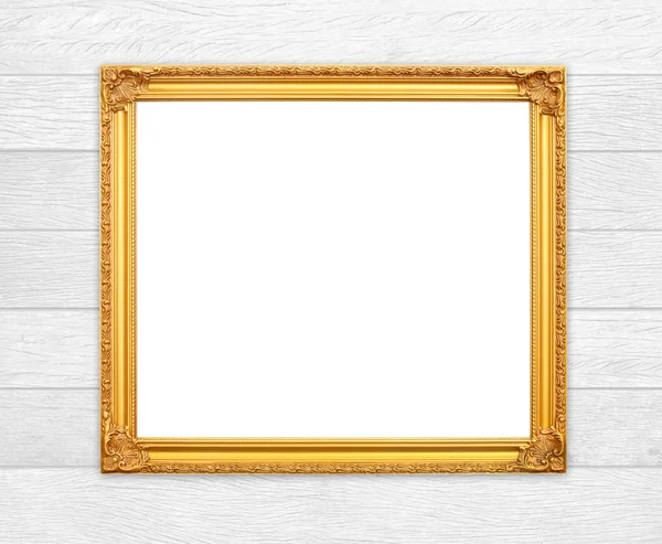 Marco dorado en blanco en la pared de madera —  Fotos de Stock