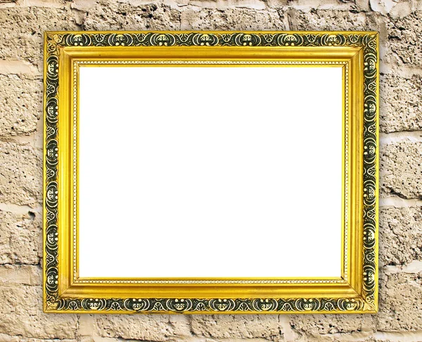 Blank golden frame on brick stone wall — Stock Photo, Image