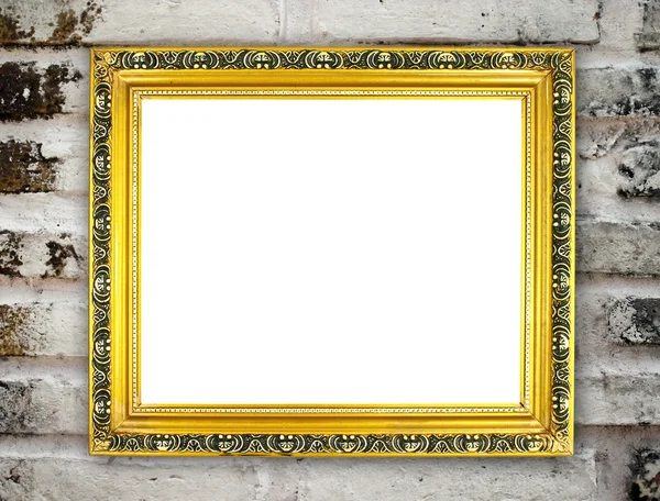 Blank golden frame on brick stone wall — Stock Photo, Image