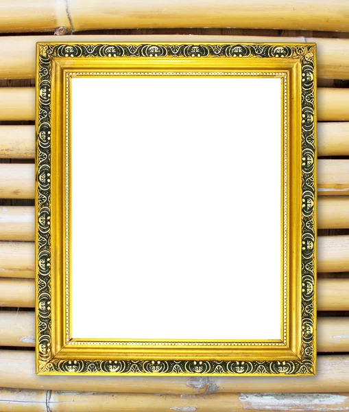 Пустая золотая рамка на красочной бамбуковой стене — стоковое фото