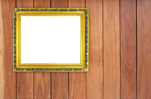 Lege gouden frame op houten muur — Stockfoto