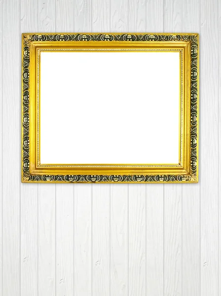 Blank golden frame on wood wall — Stock Photo, Image