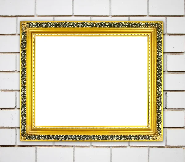 Blank golden frame on brick stone wall — Stock Photo, Image