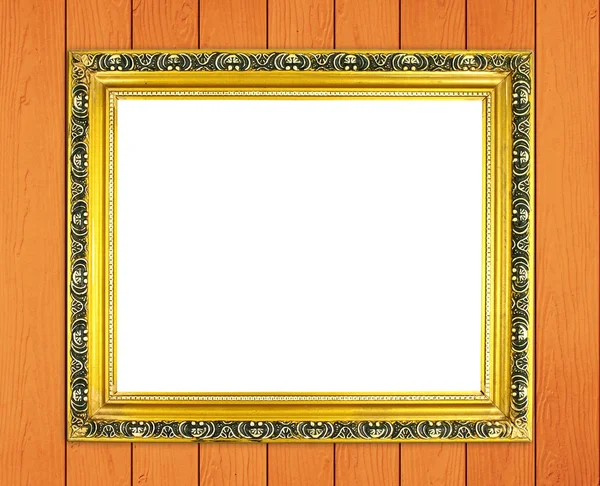 Blank golden frame on wood wall — Stock Photo, Image