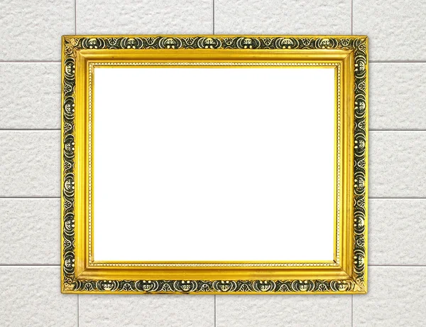 Blank golden frame on cement wall — Stock Photo, Image