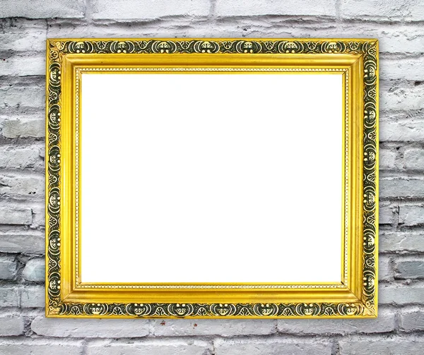 Blank golden frame on brick stone wall — Stock Photo, Image