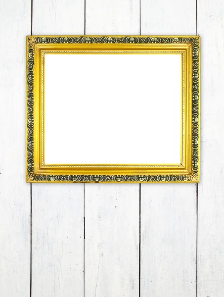 Blank golden frame on wood wall — Stock Photo, Image