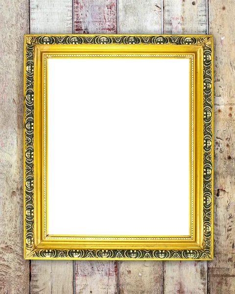 Lege gouden frame op houten muur — Stockfoto