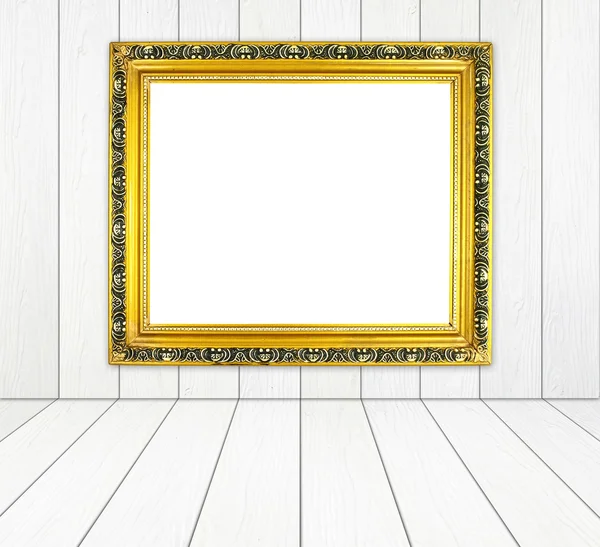 Lege gouden frame in kamer met witte houten muur en houten vloer — Stockfoto