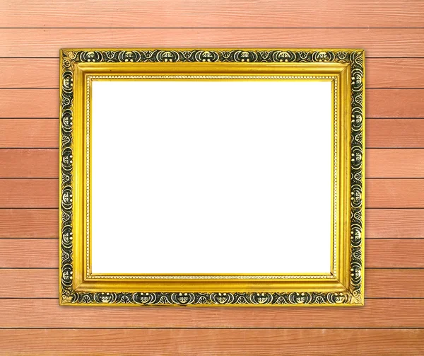 Lege gouden frame op houten muur — Stockfoto