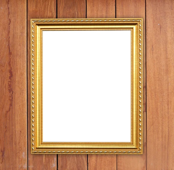 Cornice dorata bianca su parete di legno — Foto Stock