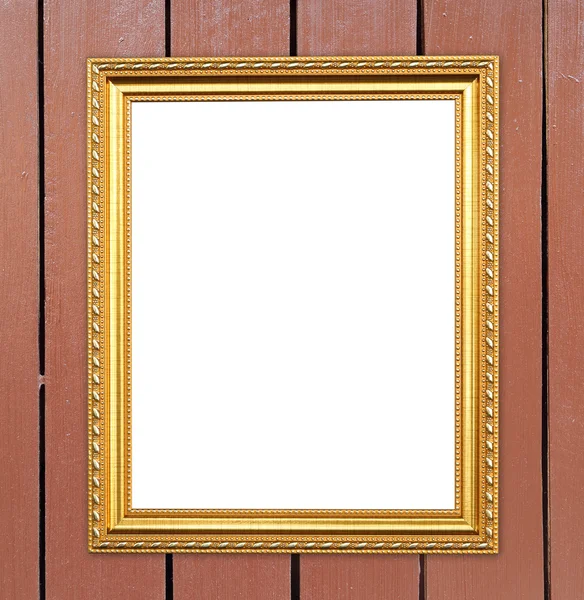 Blank golden frame on wood wall — Stock Photo, Image