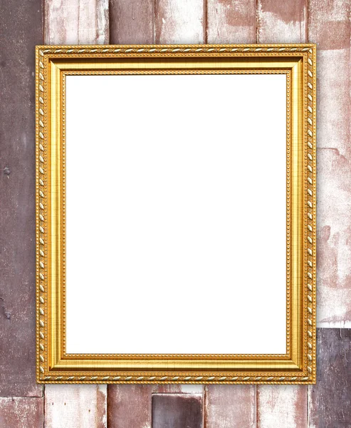 木墙上的空白金框 — 图库照片