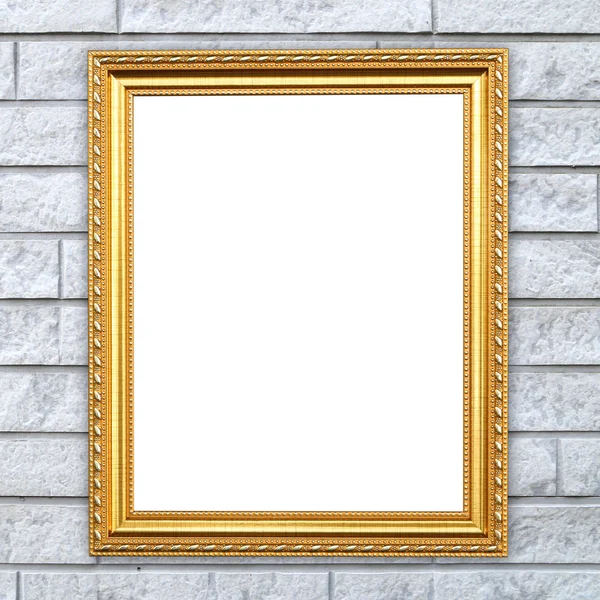 blank golden frame on brick stone wall