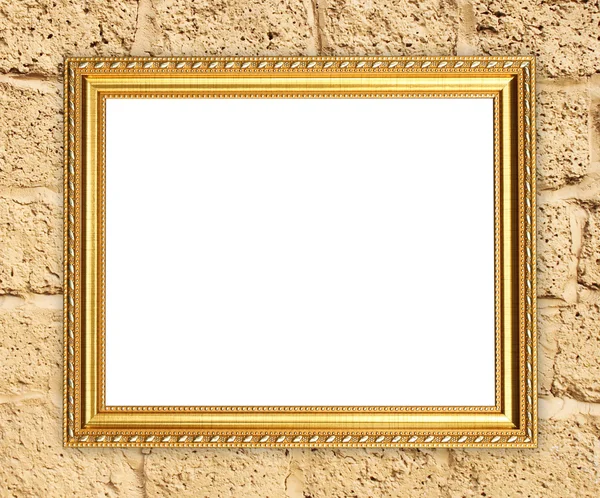 Üres arany keretben a tégla kő-fal — Stock Fotó