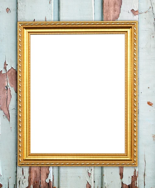 Lege gouden frame op houten muur — Stockfoto