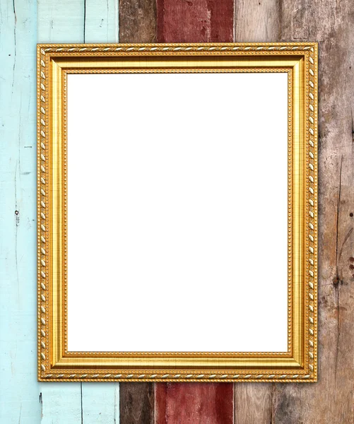 blank golden frame on wood wall