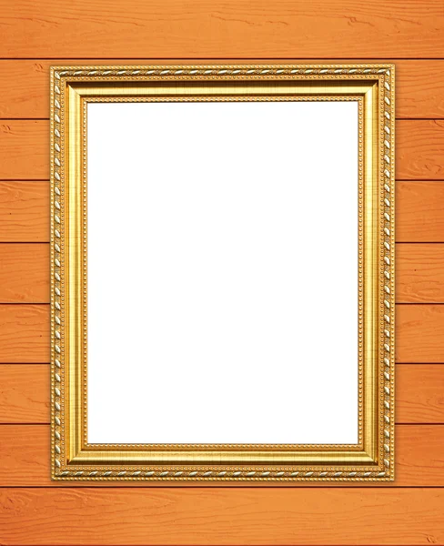 Lege gouden frame op houten muur — Stockfoto