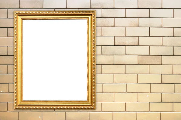 Lege gouden frame op stenen muur — Stockfoto