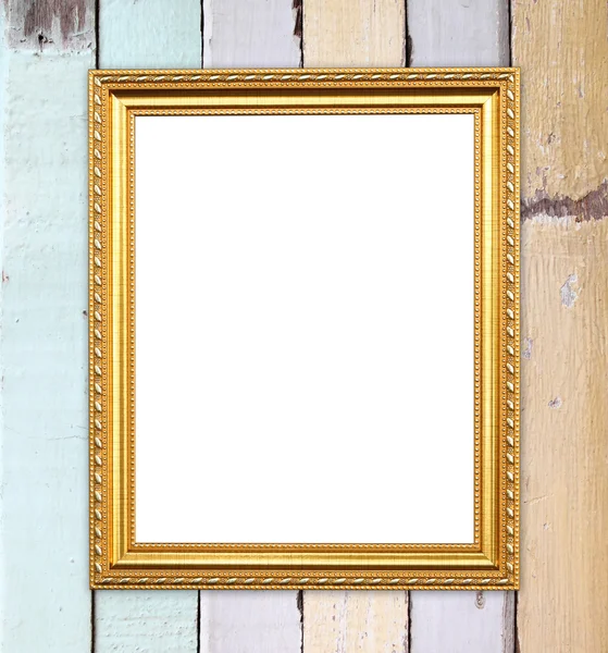 Lege gouden frame op houten muur — Stockfoto