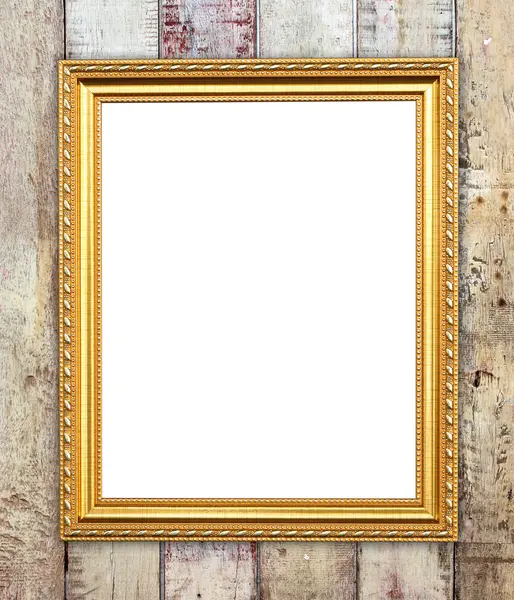 Blank golden frame on wood wall — Stock Photo, Image