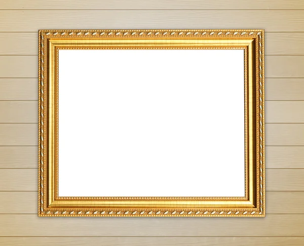 Blank golden frame on wood wall — Stock Photo, Image