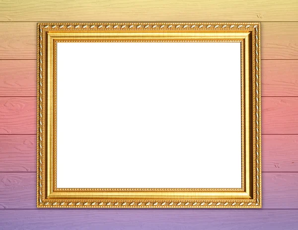 Lege gouden frame op kleurrijke houten muur — Stockfoto