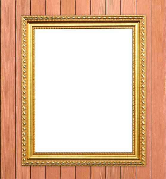Порожня золота рамка на дерев'яній стіні — стокове фото