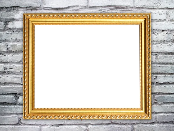 Blank golden frame on brick stone wall — Stock Photo, Image