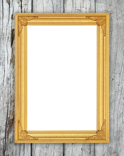 Blank golden frame on wood wall — Stock Photo, Image