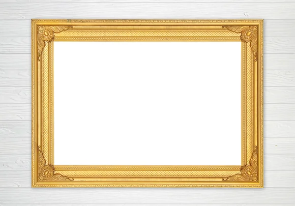 Blank golden frame on wood wall — Stock Photo, Image