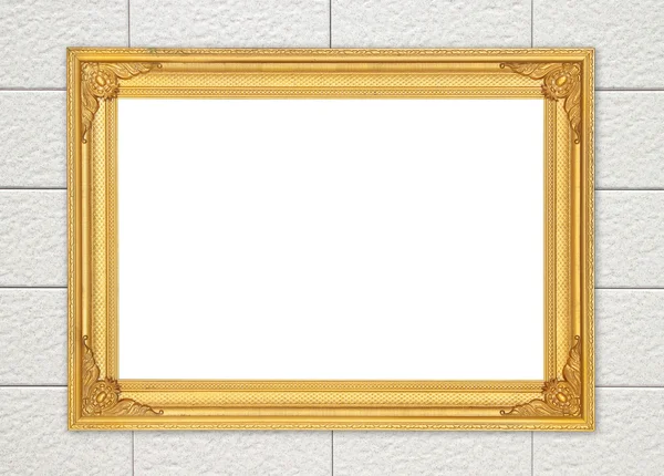 blank golden frame on brick stone wall