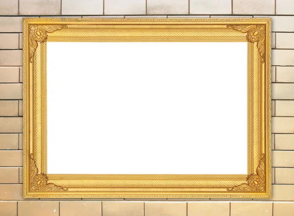 Lege gouden frame op stenen muur — Stockfoto