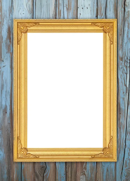 Lege gouden frame op houten muur — Stockfoto