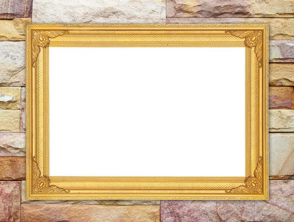 Lege gouden frame op stenen muur — Stockfoto