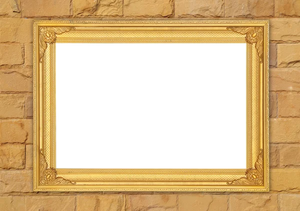 Пустая золотая рамка на кирпичной каменной стене — стоковое фото