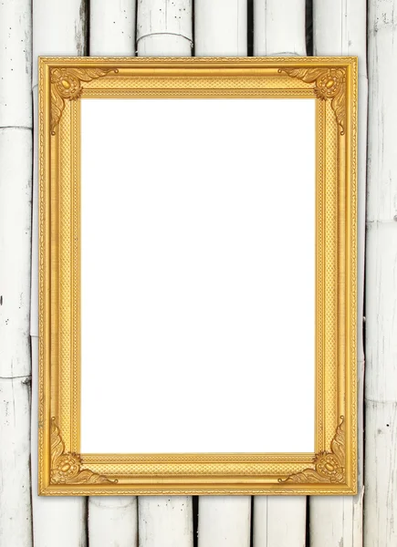 Moldura dourada em branco na parede de bambu colorido — Fotografia de Stock