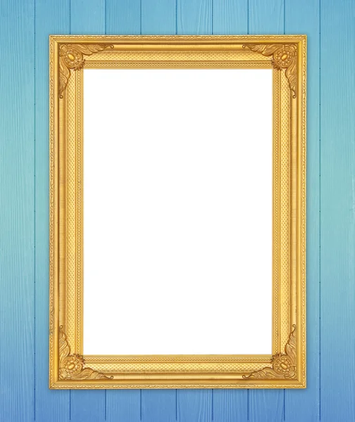 Blank golden frame on wood wall — Stock Photo, Image