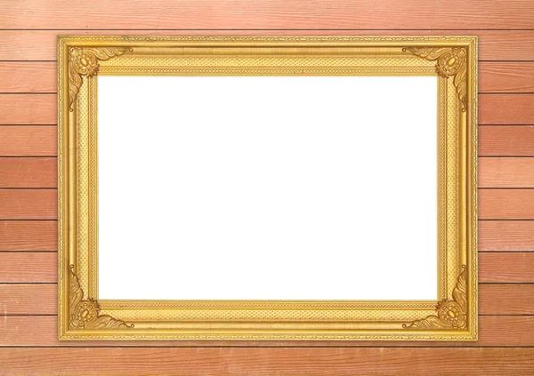 Lege gouden frame op houten muur — Stockfoto