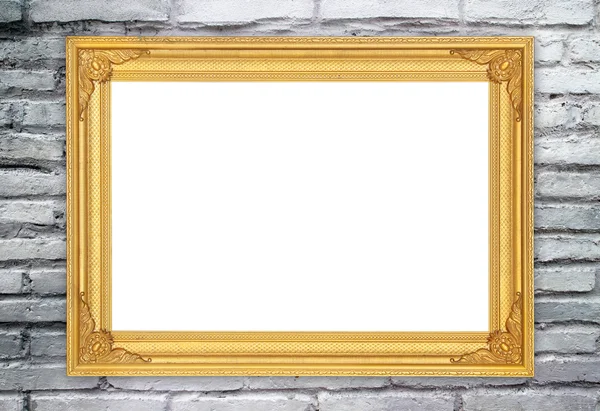 Marco de oro en blanco en la pared de piedra de ladrillo —  Fotos de Stock